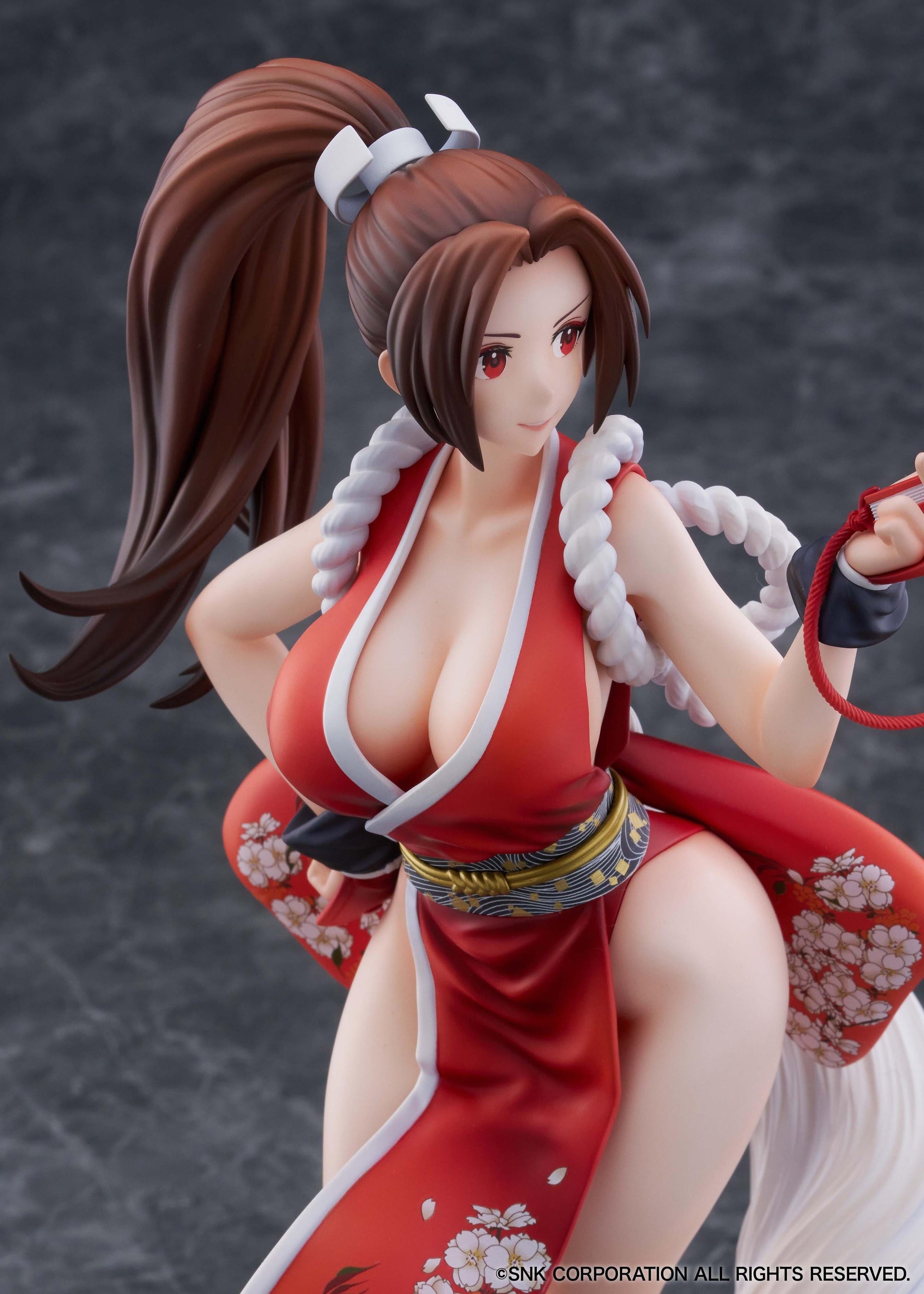 Portrait shot of the successor to Shiranui-ryu Ninjutsu, Mai Shiranui, in a bewitching stance.