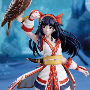 Half-body shot of Nakoruru figure showing fine paintwork and facial expression against a stylized blue backdrop