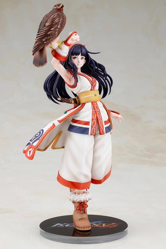 Full view of Nakoruru 1/8 scale figure standing in her traditional white and red outfit with hawk perched on raised arm