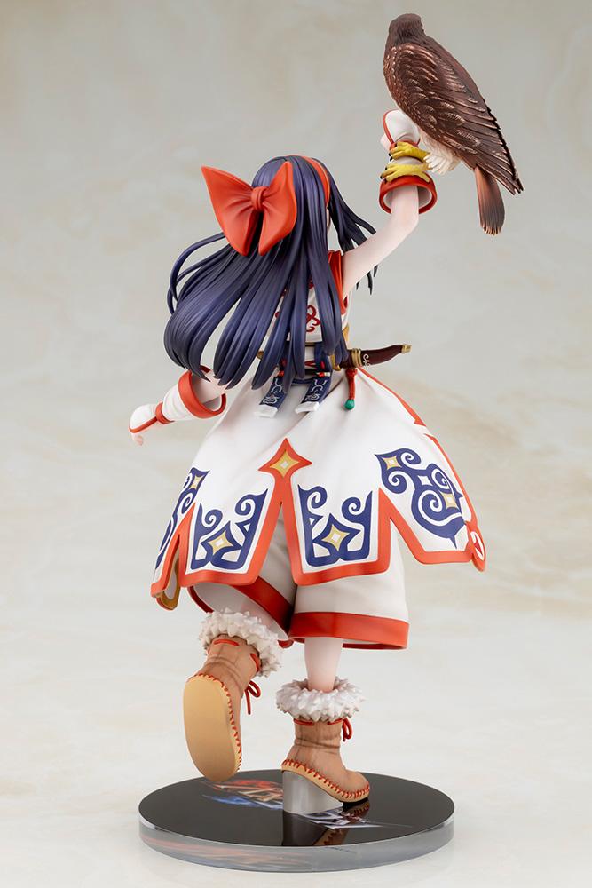 Rear left angle of Nakoruru holding hawk Mamahaha high with detailed feathers and coat pattern in focus