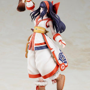 Side profile angle of Nakoruru figure displaying her side-sheathed dagger, boots, and long flowing hair