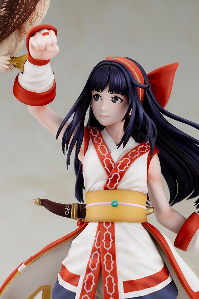Mid-shot view of Nakoruru 1/8 figure highlighting her belt ornament, dagger sheath, and robe trim details