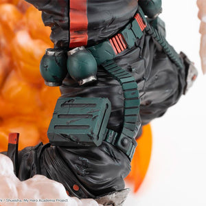 Close-up shot of Katsuki Bakugo figure leg armor, textured pants, grenade canisters, and weathered utility pouch.