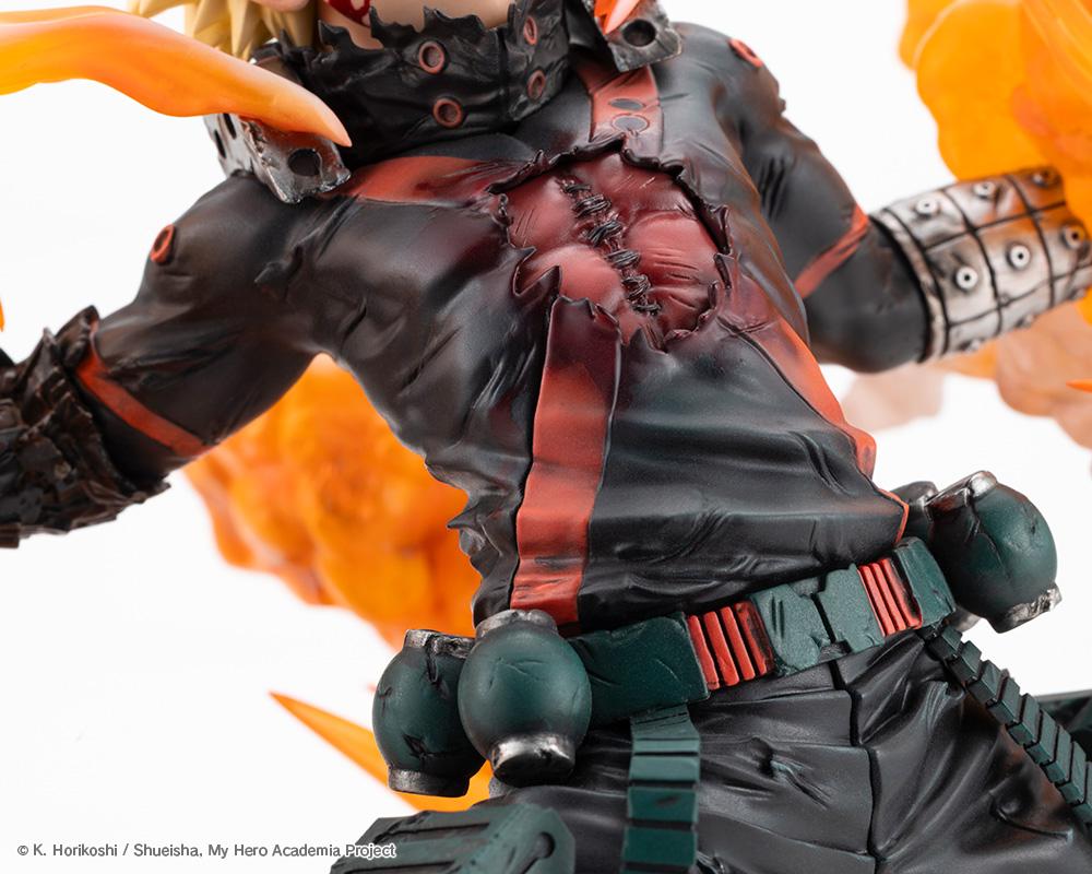 Close-up detail of Katsuki Bakugo's battle-damaged hero suit showing stitched chest injury sculpt and grenade belt.