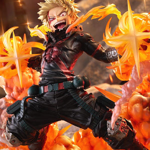 Full-body diorama display of Katsuki Bakugo ARTFX J figure with glowing embers and dramatic battlefield lighting.