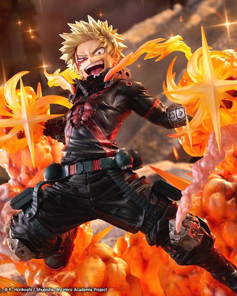Full-body diorama display of Katsuki Bakugo ARTFX J figure with glowing embers and dramatic battlefield lighting.
