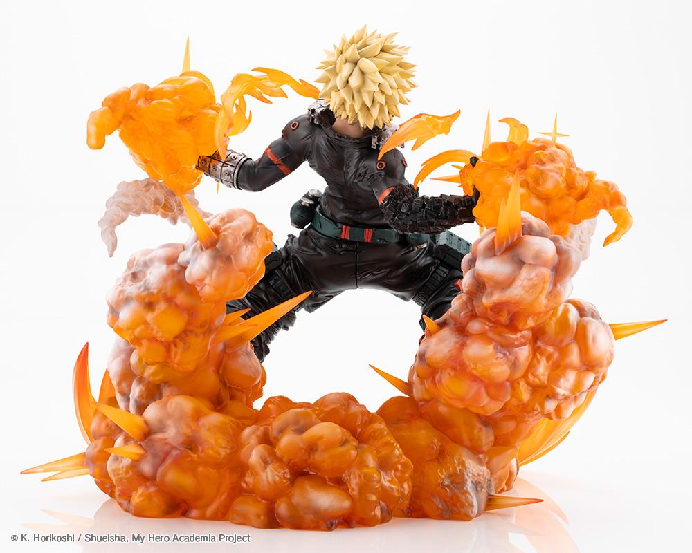 Rear back view of Katsuki Bakugo ARTFX J figure highlighting spiky blonde hair, black hero suit, and billowing smoke effect base.