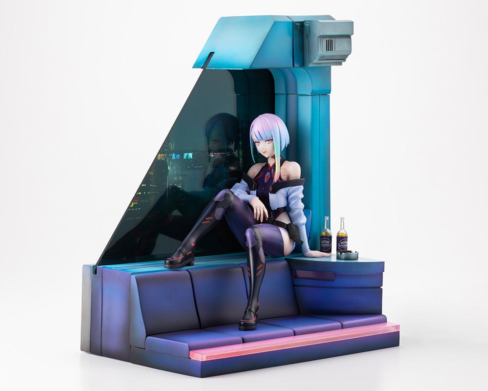 Kotobukiya Lucy 1/7 scale figure displayed on room diorama base with Night View city skyline window panel.