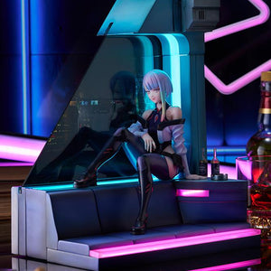 Atmospheric diorama scene of Lucy figure displayed in a cyberpunk room setting with neon bar lighting.
