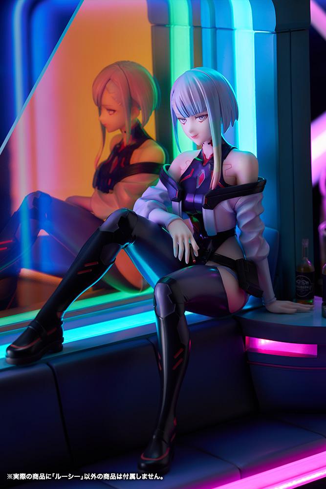Medium shot of Lucy figure showcasing dual-tone warm orange and cool cyan LED glow effects.
