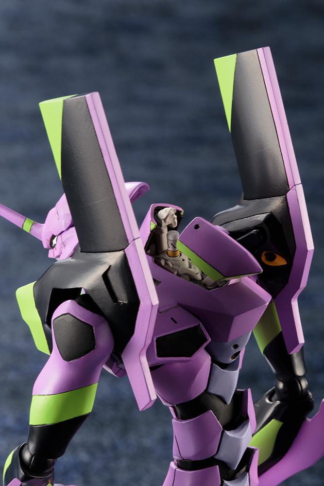 Close-up view of the upper back armor on the Kotobukiya Evangelion EVA-01 model kit showing the open entry plug hatch mechanism.