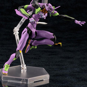 Dynamic leaping combat pose of the Kotobukiya EVA-01 model kit attacking downward with the Progressive Knife accessory.