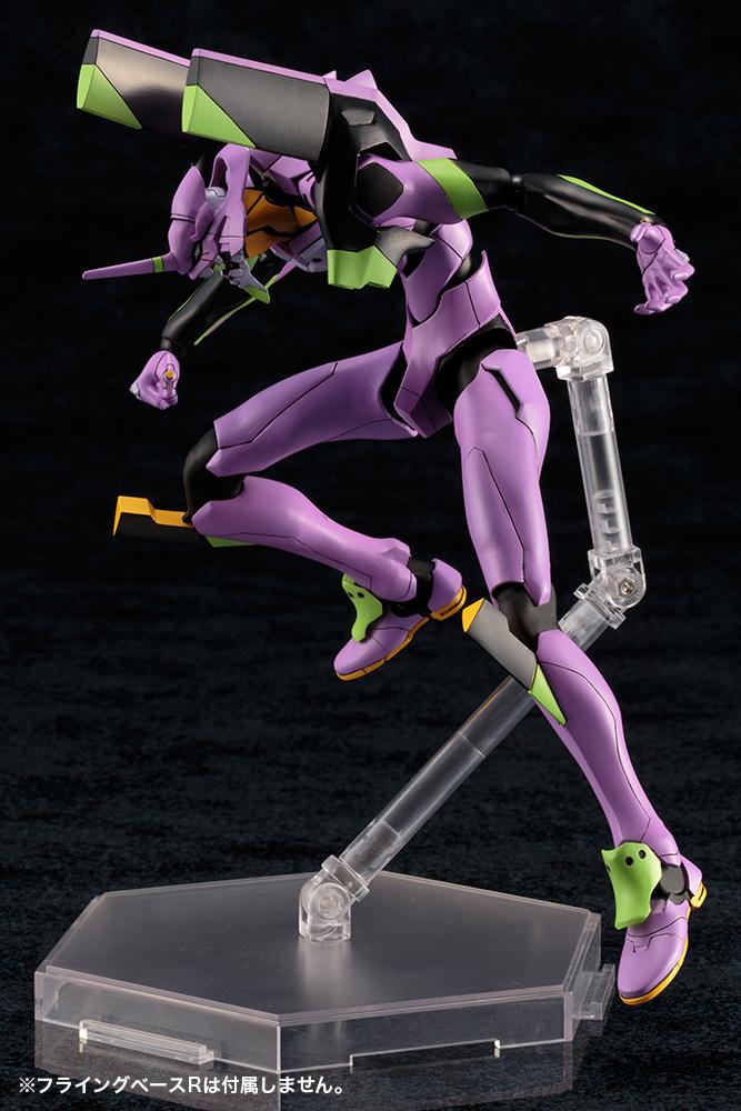 Mid-air jumping pose of the Kotobukiya EVA-01 TV Version model kit displayed on a clear plastic action stand.