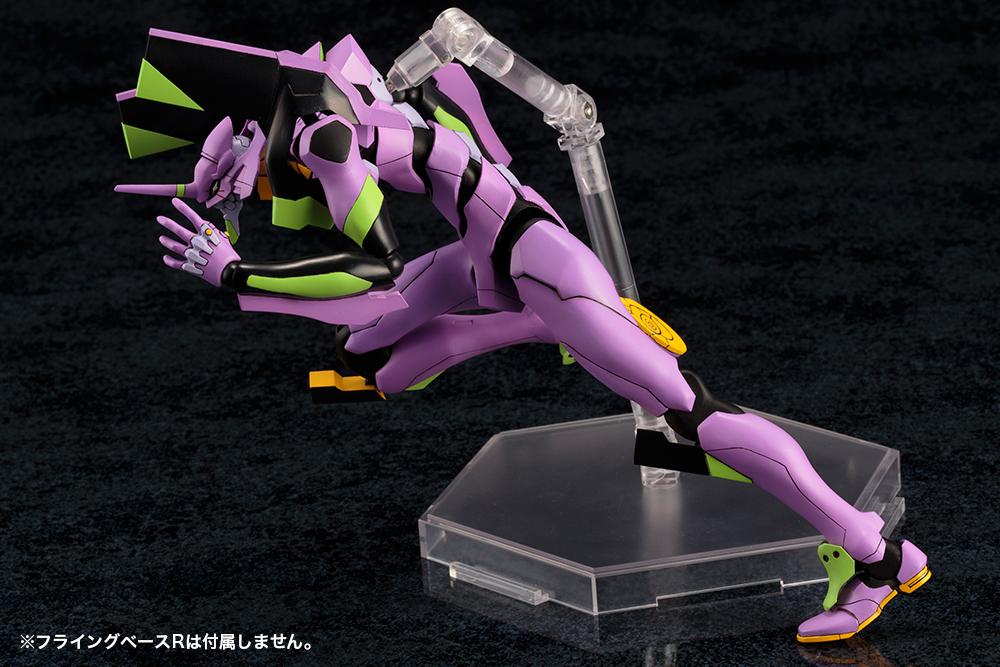 Low profile crouching dash pose of the purple Kotobukiya EVA-01 Test Type plastic model kit supported by a clear base.