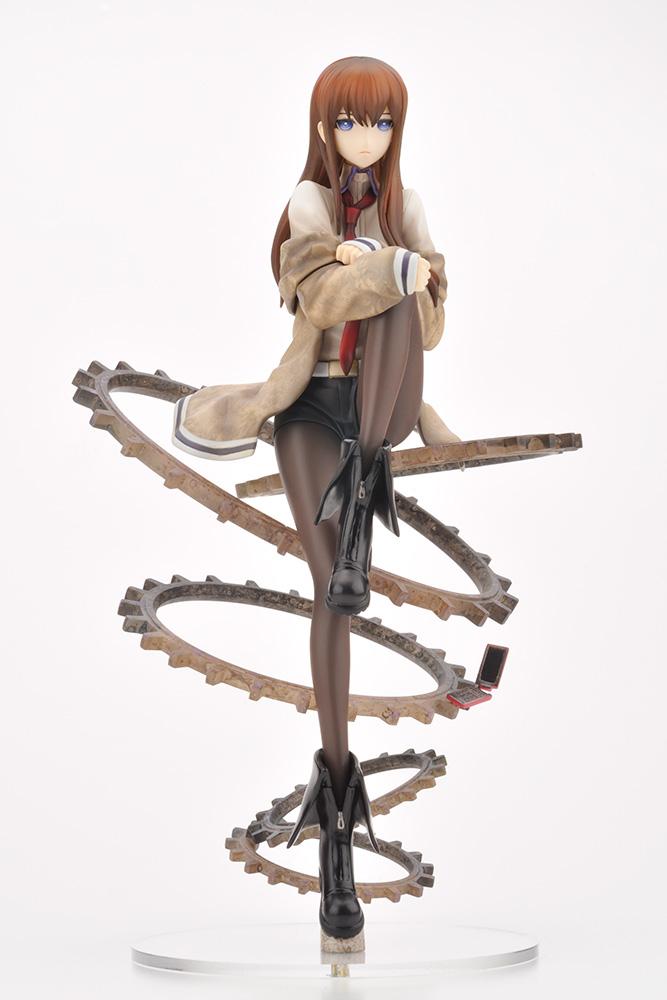 Three-quarter front view of Kotobukiya Kurisu Makise scale figure showing her brown jacket, necktie, and tights