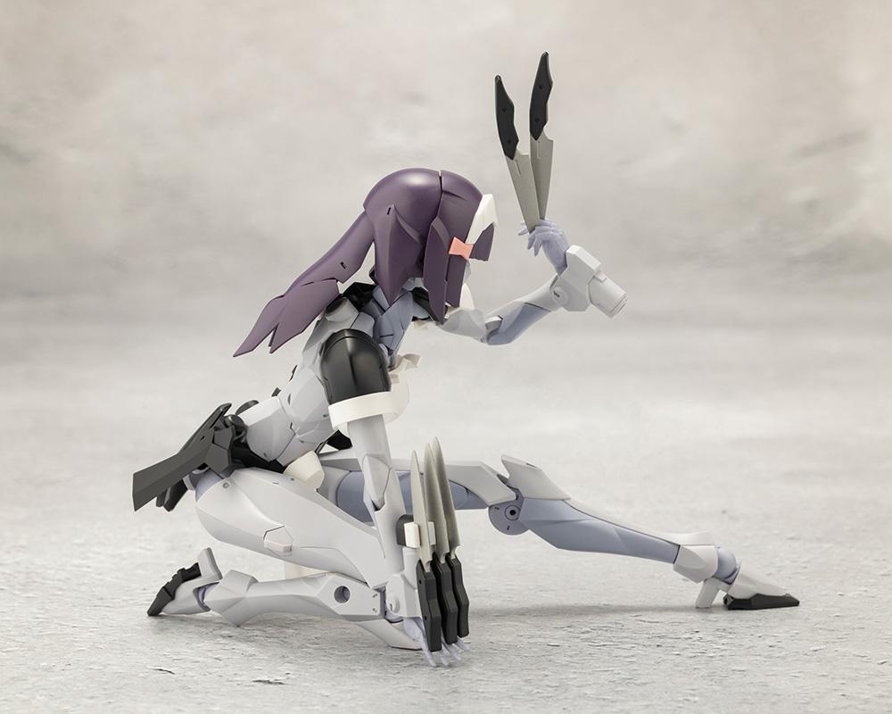 Side profile of Kotobukiya Megalomaria Novice in a grounded tactical crouch holding knife accessories.