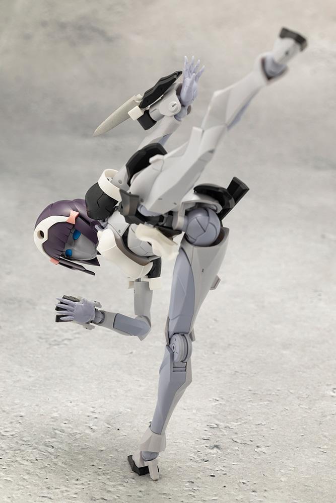 High-angle dynamic action view of Kotobukiya Megalomaria Novice model kit performing a balanced high kick pose.