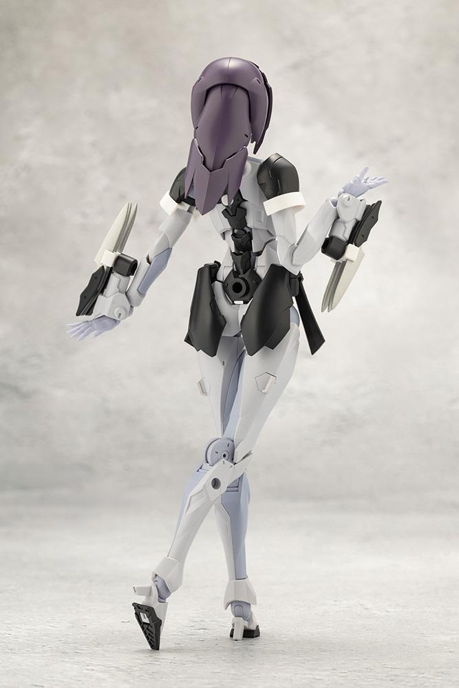 Rear back view of Kotobukiya Megalomaria Novice model kit showing long purple headpiece hair armor and rear waist details.