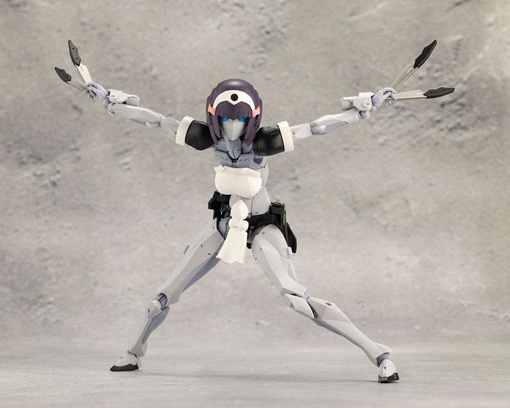 Wide dynamic battle stance of Kotobukiya Megalomaria Novice with outstretched arms ready to throw multiple knives.