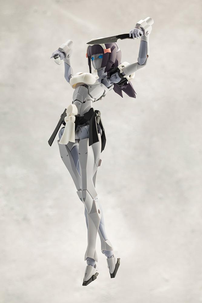 Graceful dancing pose of Kotobukiya Megalomaria Novice model kit wielding combat knives overhead.