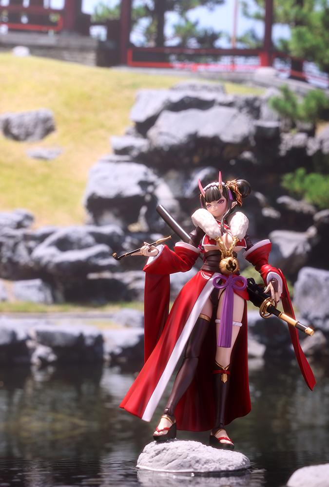 Outdoor diorama photo of Ornela in Normal Mode posing on a rock in a traditional Japanese garden pond