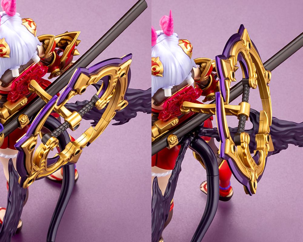 Two-panel close-up detail showcasing the mounting joint for the large circular ring weapon