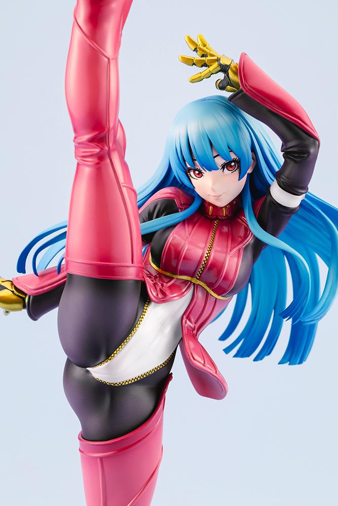 Close-up portrait view of the Kula Diamond anime statue highlighting her face sculpt, red eyes, and detailed gold-fingered gloves.