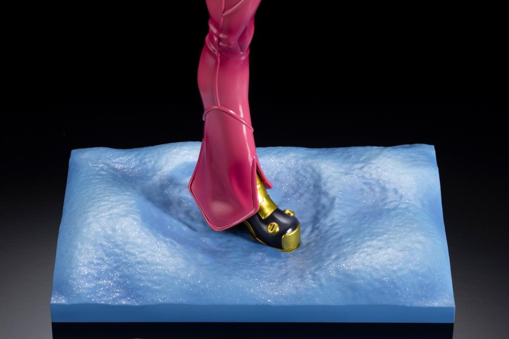 Detailed close-up view of the glittery snow-covered Freezing Forest display base and the gold and black boot of the Kula Diamond figure.