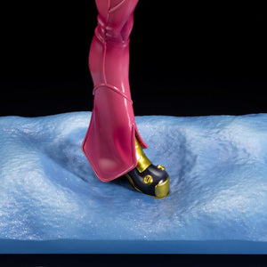 Detailed close-up view of the glittery snow-covered Freezing Forest display base and the gold and black boot of the Kula Diamond figure.