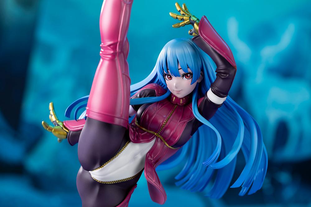 Close-up dynamic view of Kula Diamond Bishoujo statue with cinematic lighting emphasizing her hair and facial features against a blue background.