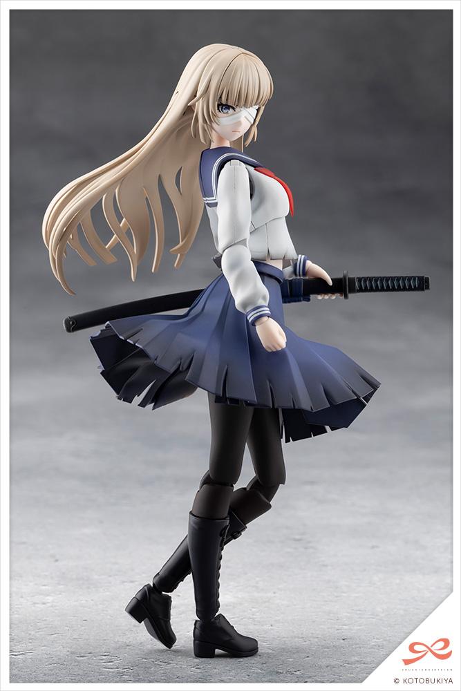 Full side profile shot of the Kuon Yakushiji figure highlighting her flowing blonde hair and frayed, battle-damaged school uniform jacket.