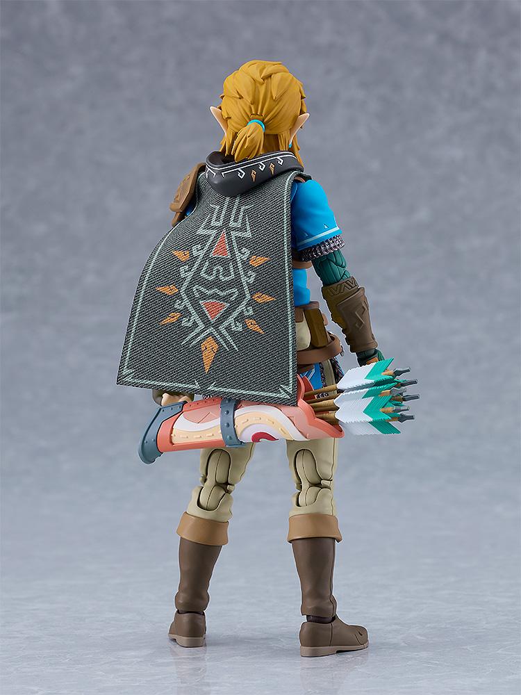 Rear view of the Link figure wearing the fabric-style Hylian Hood with detailed embroidery.