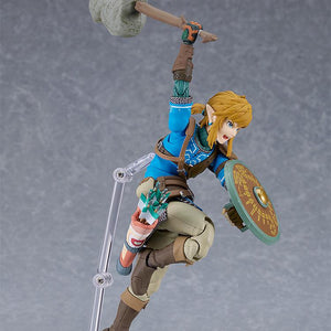 High-action jumping pose of the Link figma about to strike with the Rock Hammer accessory.