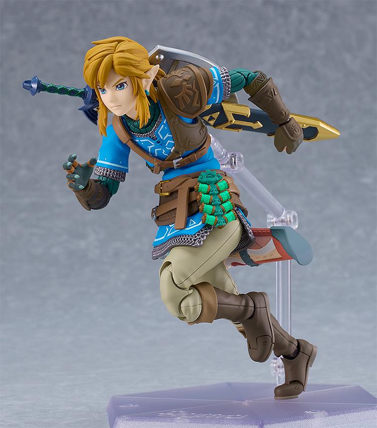 Dynamic sprinting pose of the Link figma figure supported by the articulated display stand.