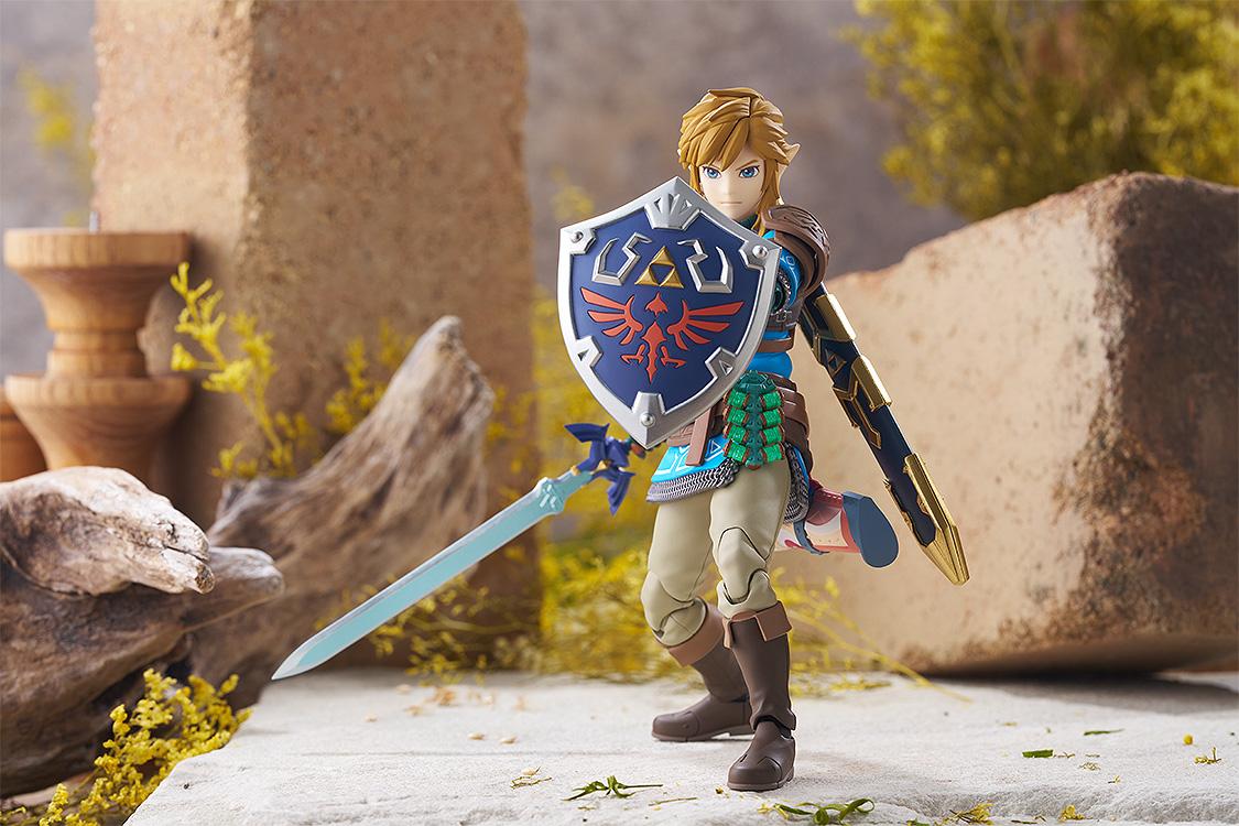 Wide cinematic shot of the figma Link action figure in a combat-ready stance with the Master Sword.