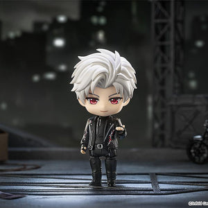 Sylus Nendoroid figure posed in a dark city alleyway diorama scene next to a miniature motorcycle.