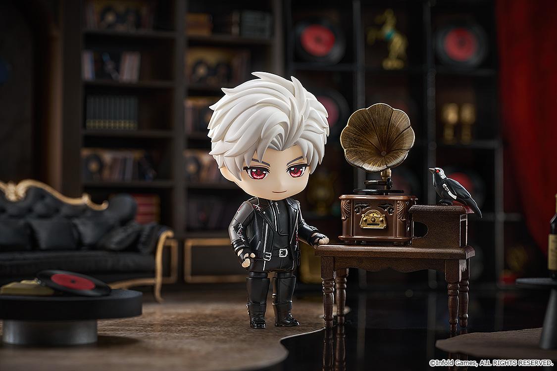 Sylus Nendoroid figure standing beside a vintage gramophone table with crow Mephisto perched in a study diorama.