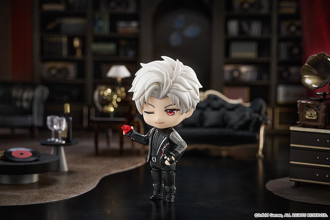 Sylus Nendoroid holding a ruby gem in a luxury lounge diorama with leather couch and gramophone.