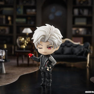 Sylus Nendoroid holding a ruby gem in a luxury lounge diorama with leather couch and gramophone.