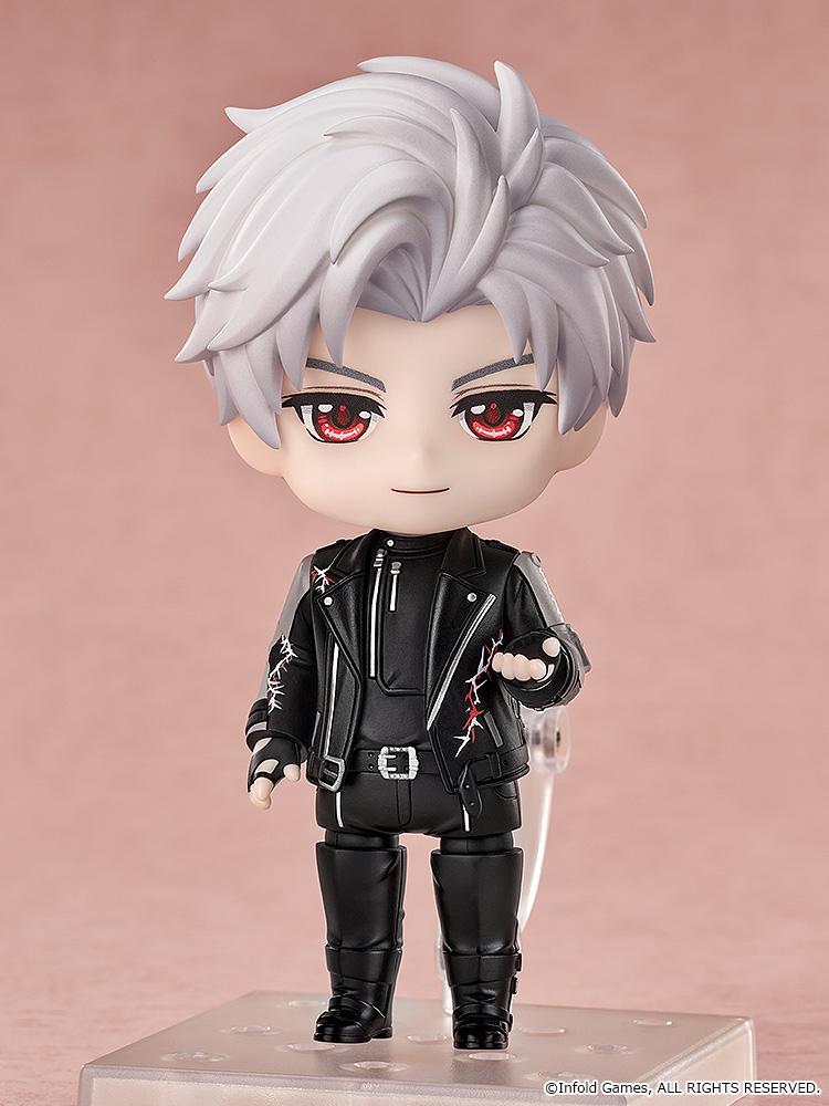 Full body studio shot of Sylus Nendoroid figure standing on clear base with smiling face plate.