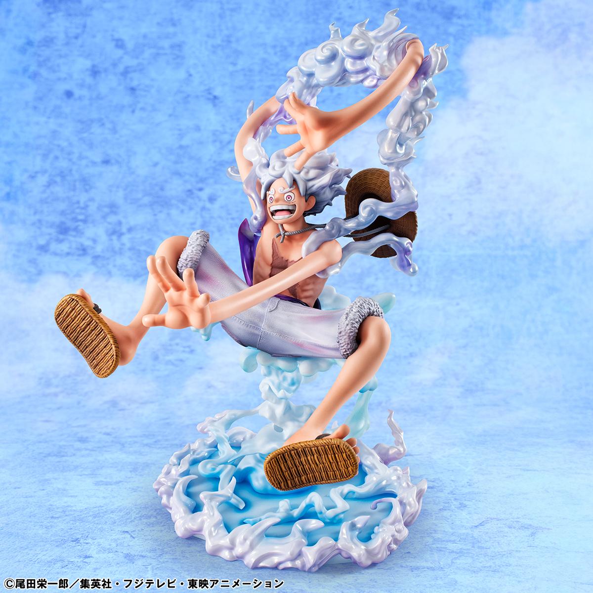 Dynamic low-angle view of Monkey D. Luffy Gear 5 figure showcasing his laughing expression.