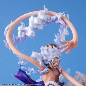 Close-up angled view of Luffy's face, showcasing the high-precision paintwork on his signature grin.
