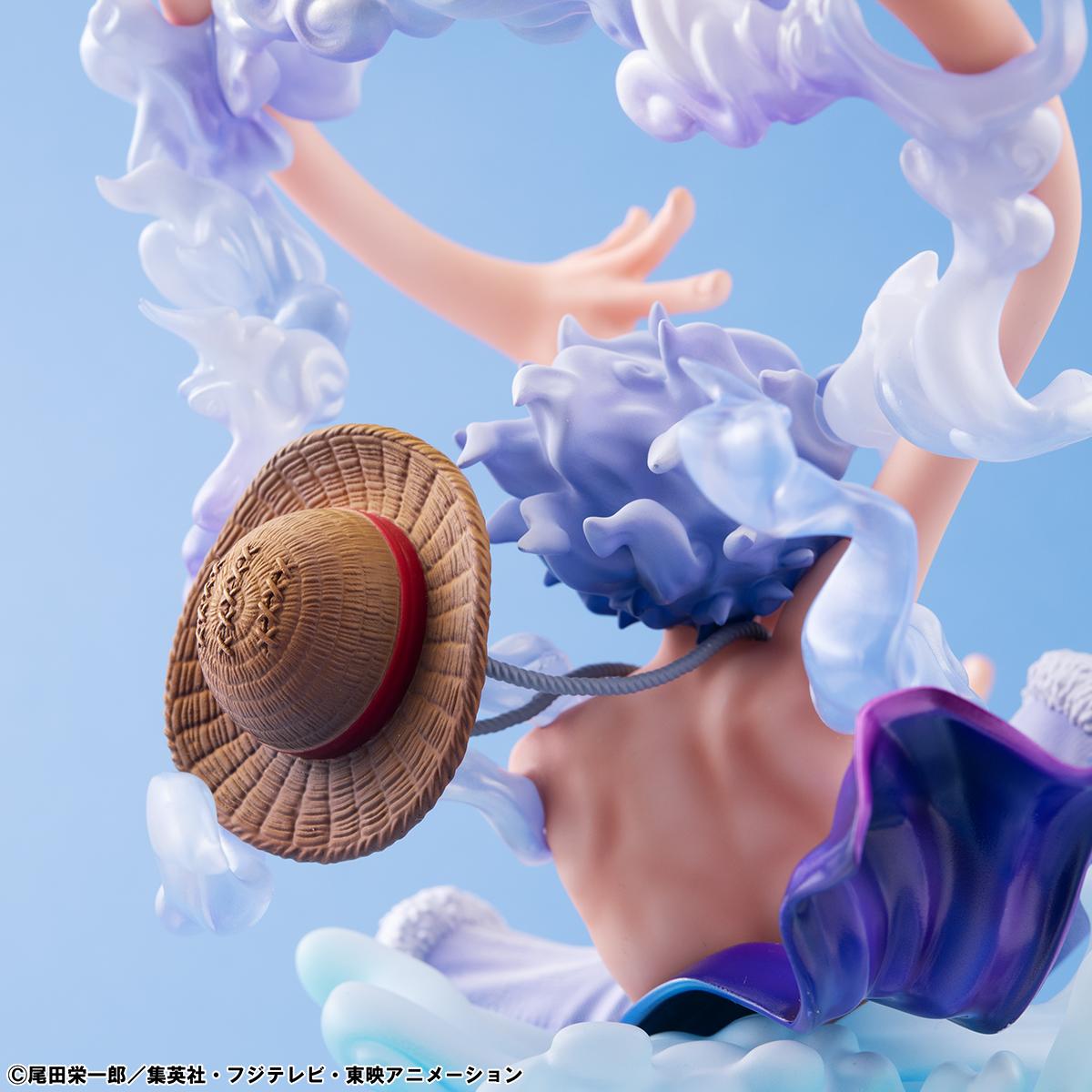 Detailed view of the pearlescent white clouds and dynamic muscle sculpting on the Luffy Gear 5 figure.