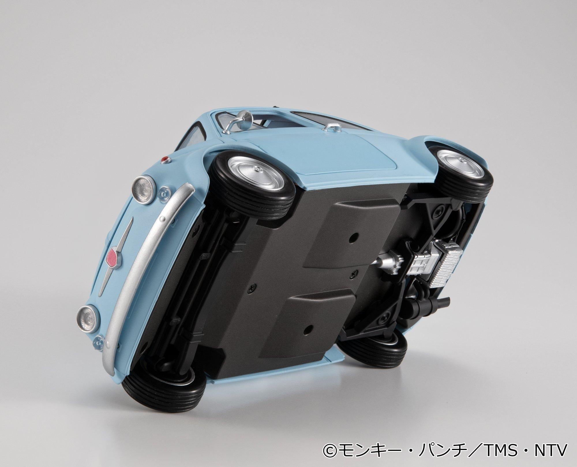 Detailed bottom chassis and exhaust system view of the 1/20 scale ice blue vehicle.