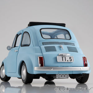 Low-angle rear view of the ice blue car highlighting tail lights and license plate detail.