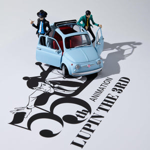 High-angle shot of Lupin The Gallery 55th anniversary model set over logo shadow backdrop.