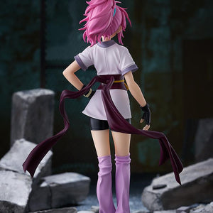 Rear view of the Machi anime figure standing in a highly detailed ruins setting, showcasing the dynamic flow of the waist ribbons.