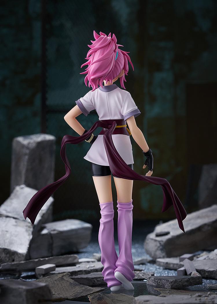 Rear view of the Machi anime figure standing in a highly detailed ruins setting, showcasing the dynamic flow of the waist ribbons.