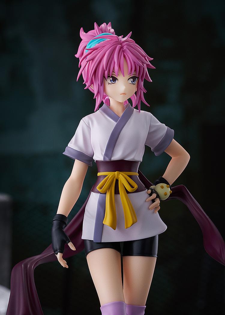 Medium shot of the Machi figure from Hunter x Hunter in an urban diorama, emphasizing the character's intense expression.