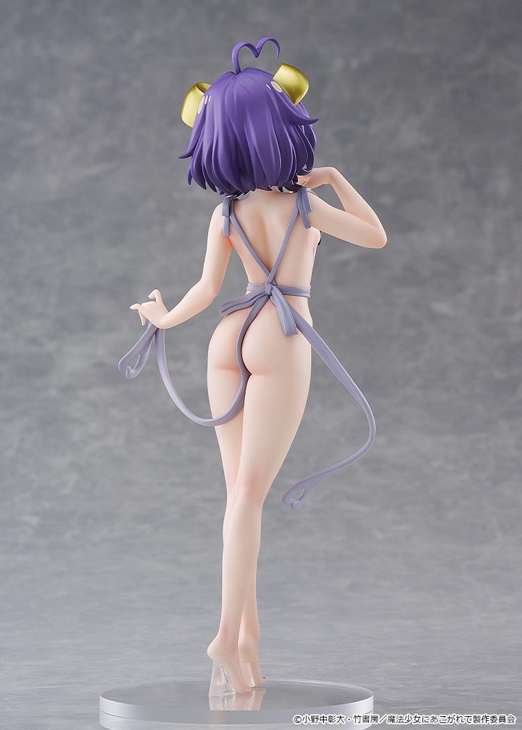 Rear view of the Magia Baiser Naked Apron Version Pop Up Parade L figure, displaying the apron's tied back straps and short purple hair details.